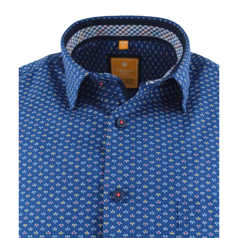 chemisette fantaisie sur fond bleu foncé par Redmond